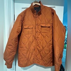 Nomad Men's Quilted Shirt Jacket in Burnt Orange